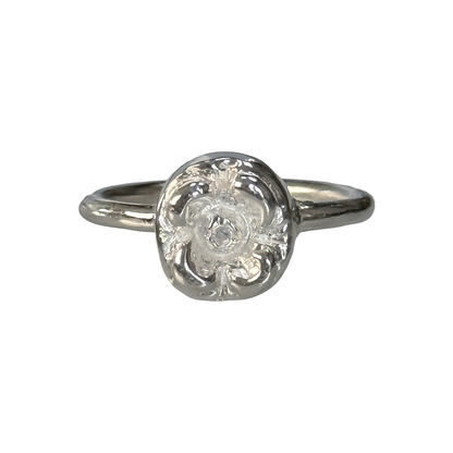 Silver lotte ring on a white background
