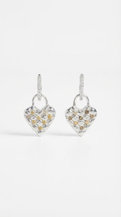 Handcrafted lucky heart earrings, close-up of quilted texture and gemstones — Nounou Studio