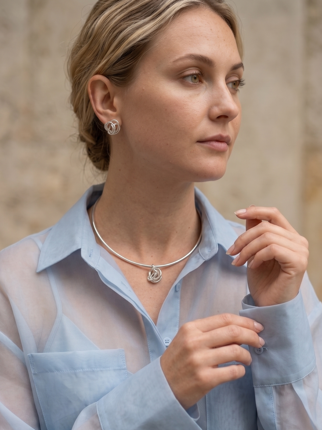 Minimalist rose stud earrings and necklace worn by a model — Nounou Studio