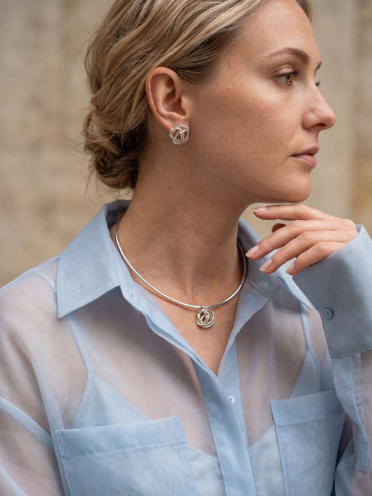 Minimalist rose stud earrings and necklace worn by a model — Nounou Studio