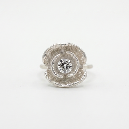Silver poppy ring detail shot showing texture and gemstone — Nounou Studio