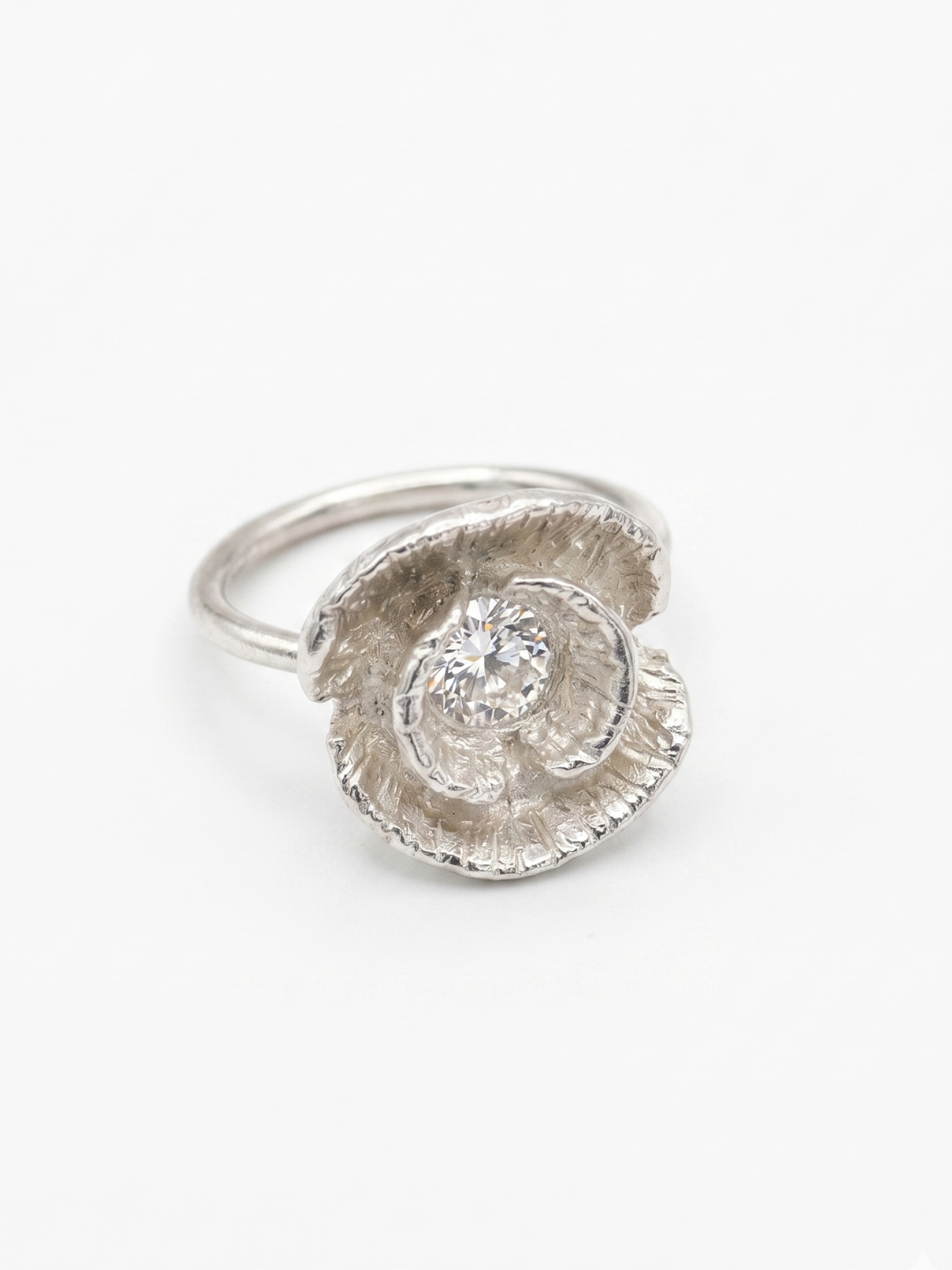 Silver poppy ring detail shot showing texture and gemstone — Nounou Studio
