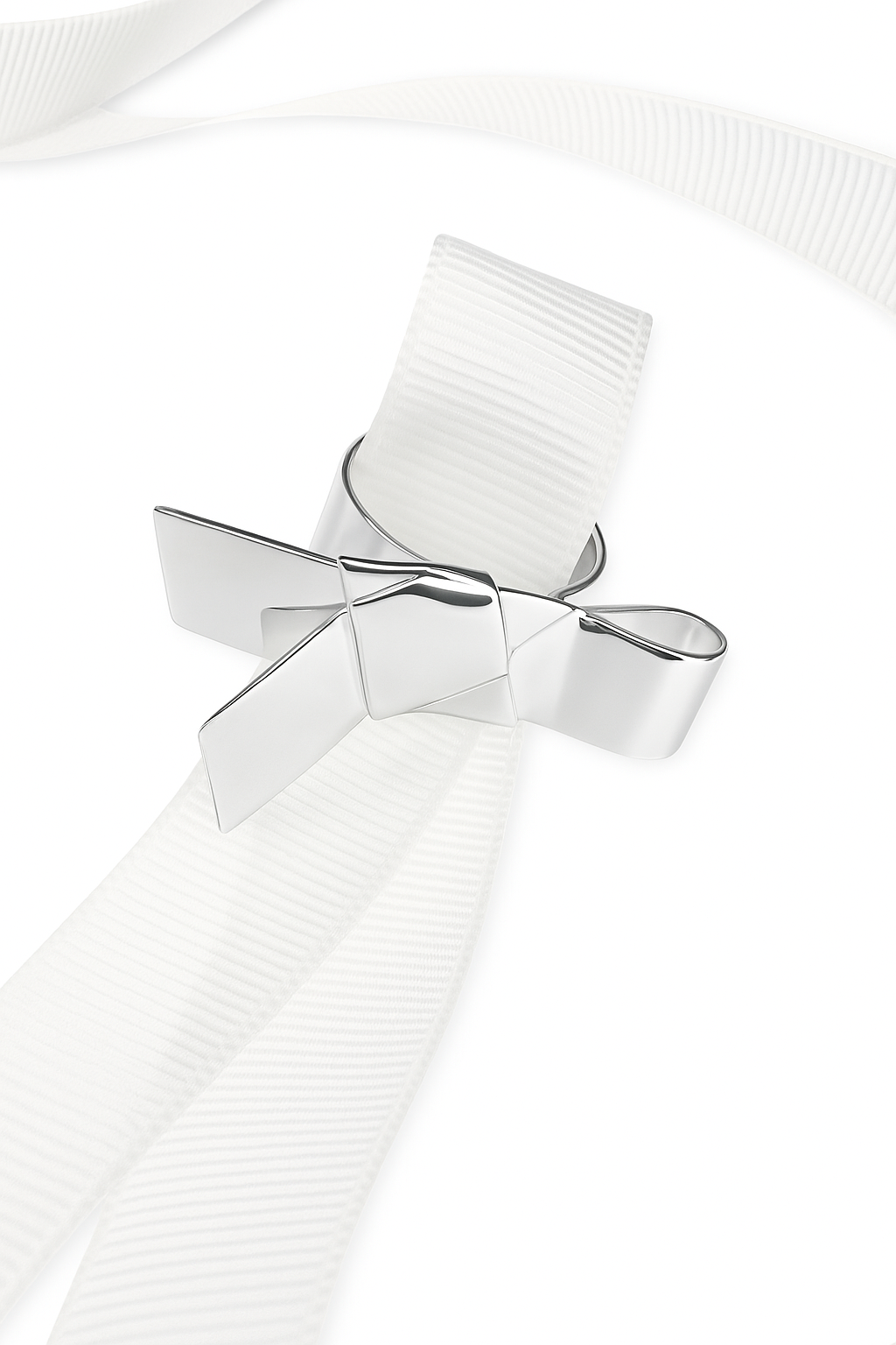 White ribbed fabric with a silver bow ring on a white background