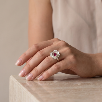 Silver poppy ring worn on model's hand, close-up — Nounou Studio