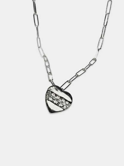 Necklace with a heart-shaped pendant on a white background