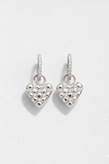 Silver quilted heart earrings on white background — Nounou Studio